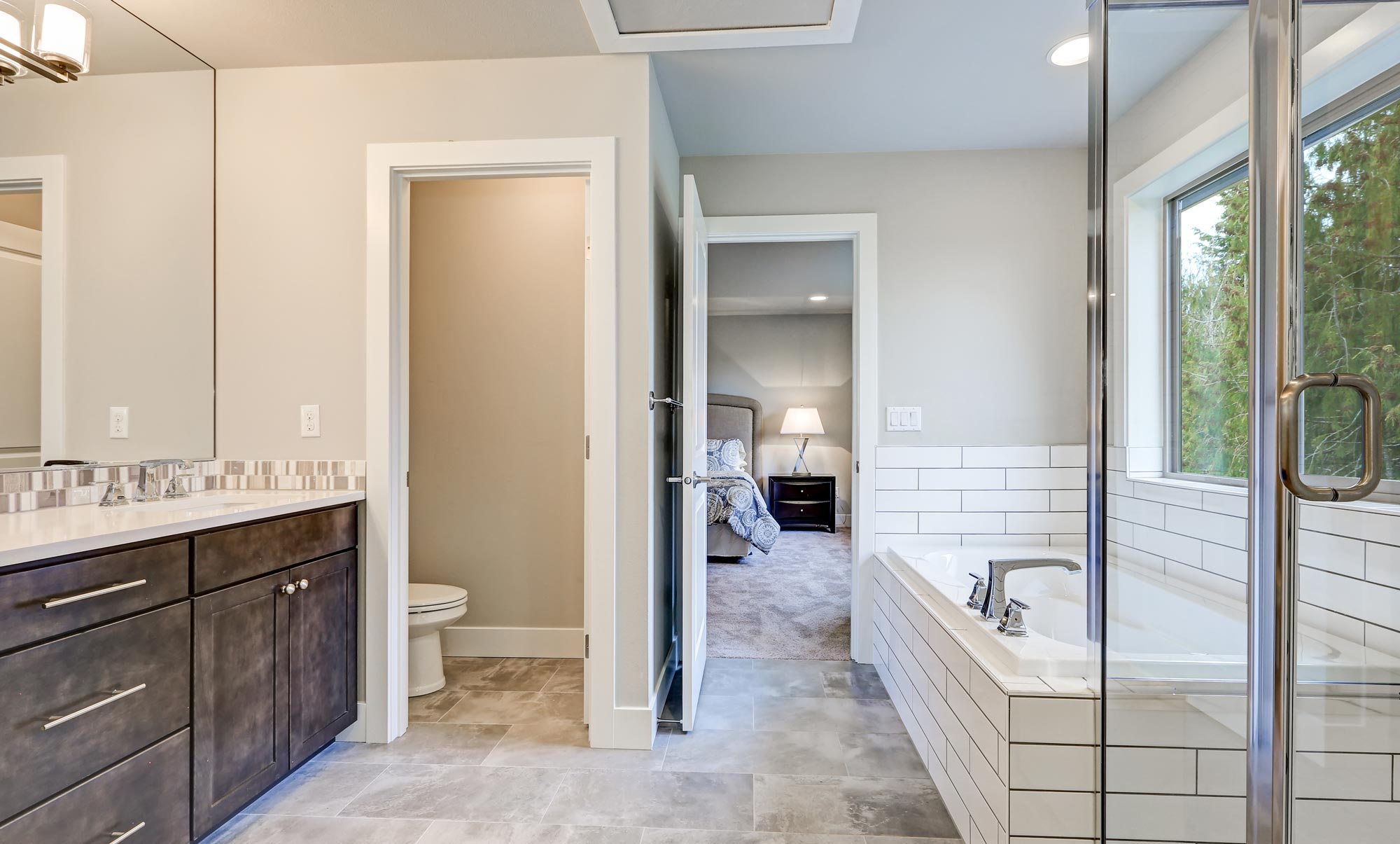 Photo of a bathroom with bath and shower